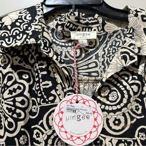 UMGEE- Size Small 💯 Cotton dress. NWT Darling dress is a year around staple!